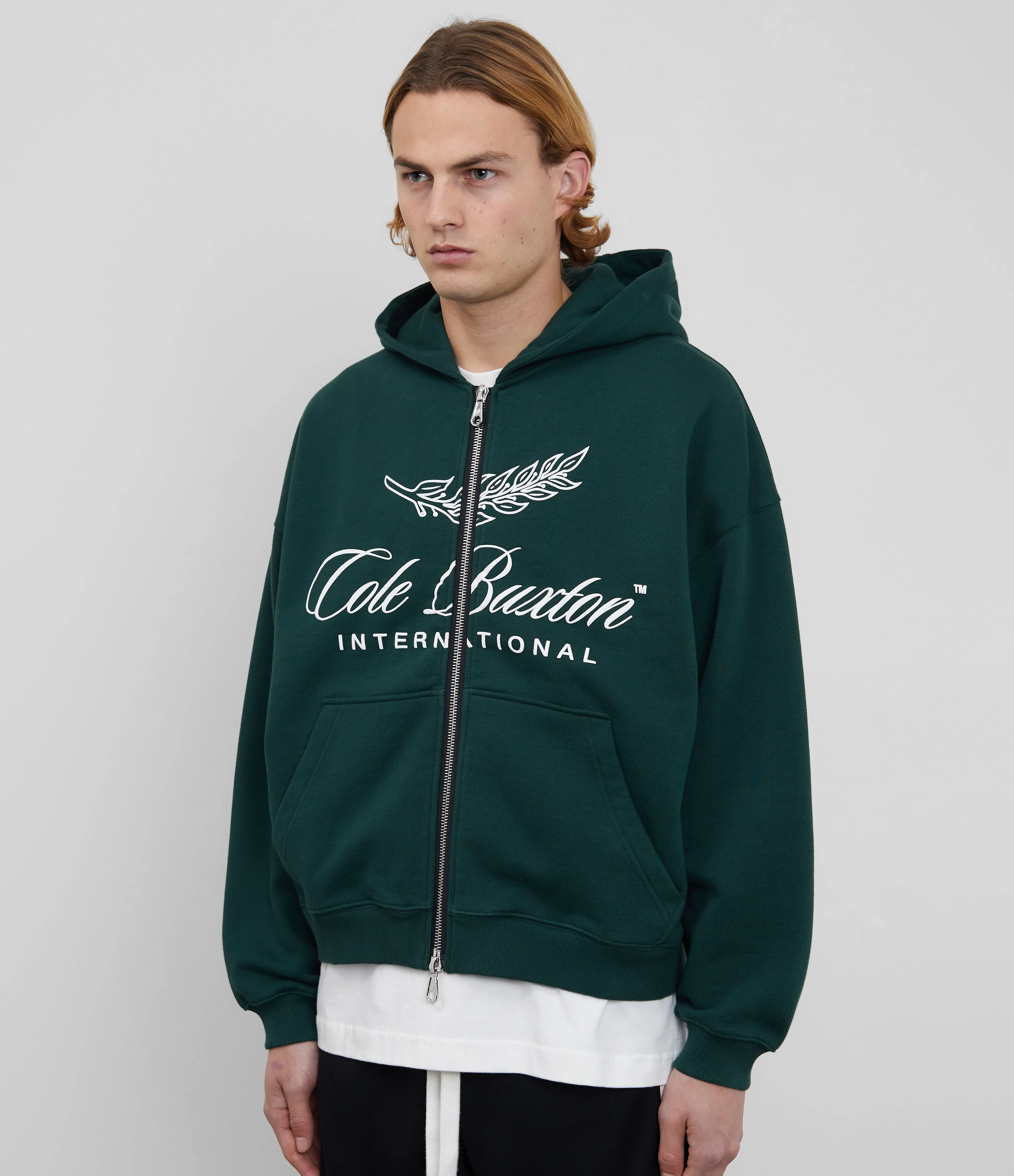 INTERNATIONAL ZIPPED HOODIE