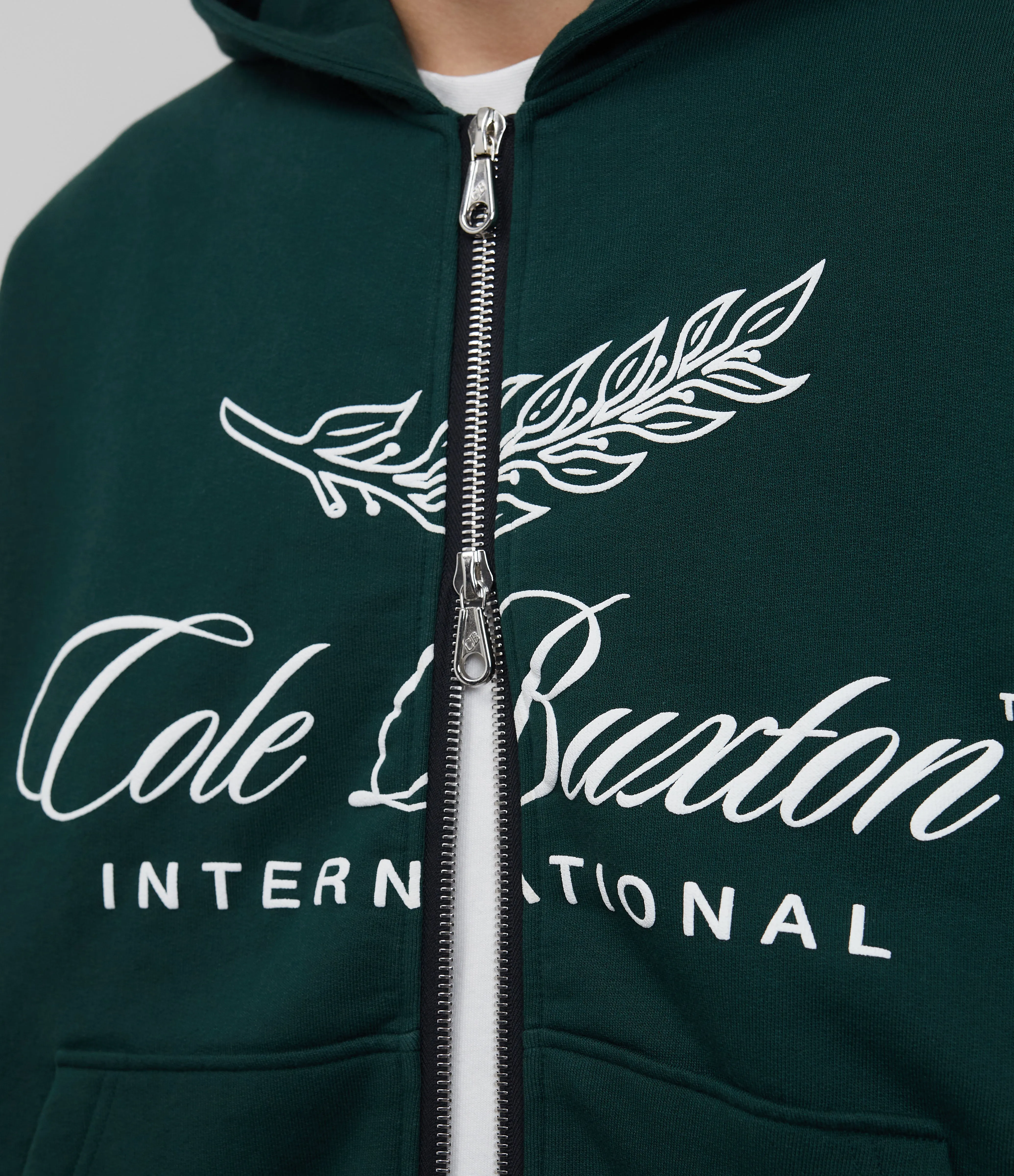 INTERNATIONAL ZIPPED HOODIE