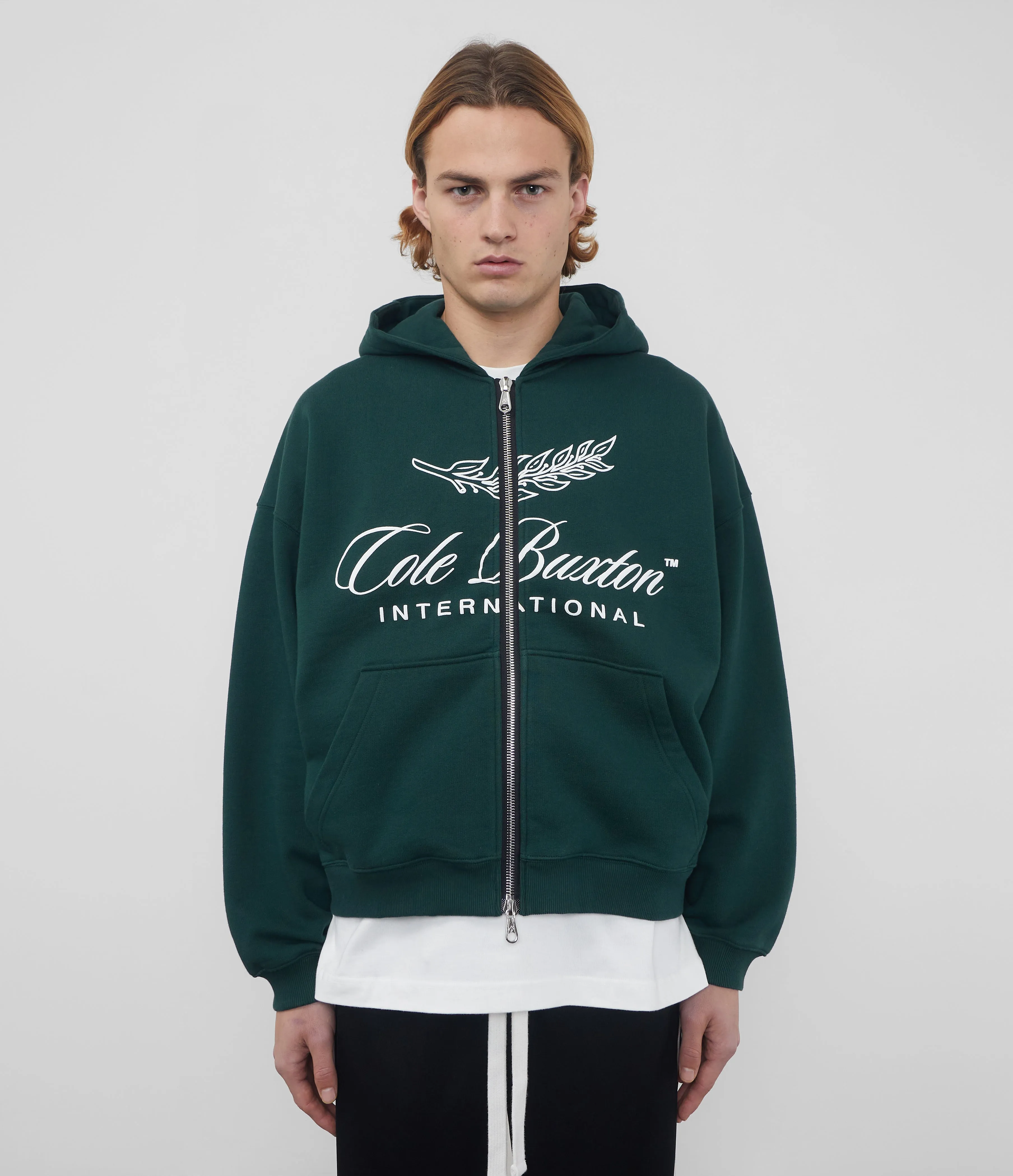 INTERNATIONAL ZIPPED HOODIE